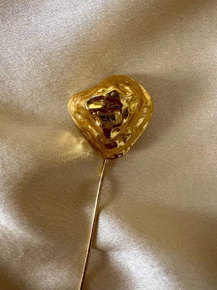 Spillone dorato con pepita “Yves Saint Laurent”