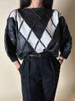 Blusa vintage in pelle nera e bianca patchwork con lavorazione crochet e maniche a pipistrello