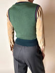 Gilet in lana verde prato con scollo a V e profili a contrasto verde bosco