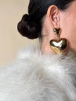 Maxi clip oro con cuori pendenti “Moschino”