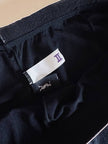 Collant vintage Yves Saint Laurent in lycra lucida nera con elastico logato