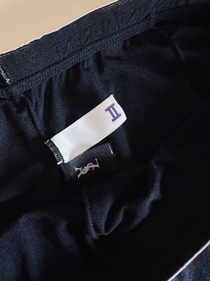 Collant vintage Yves Saint Laurent in lycra lucida nera con elastico logato