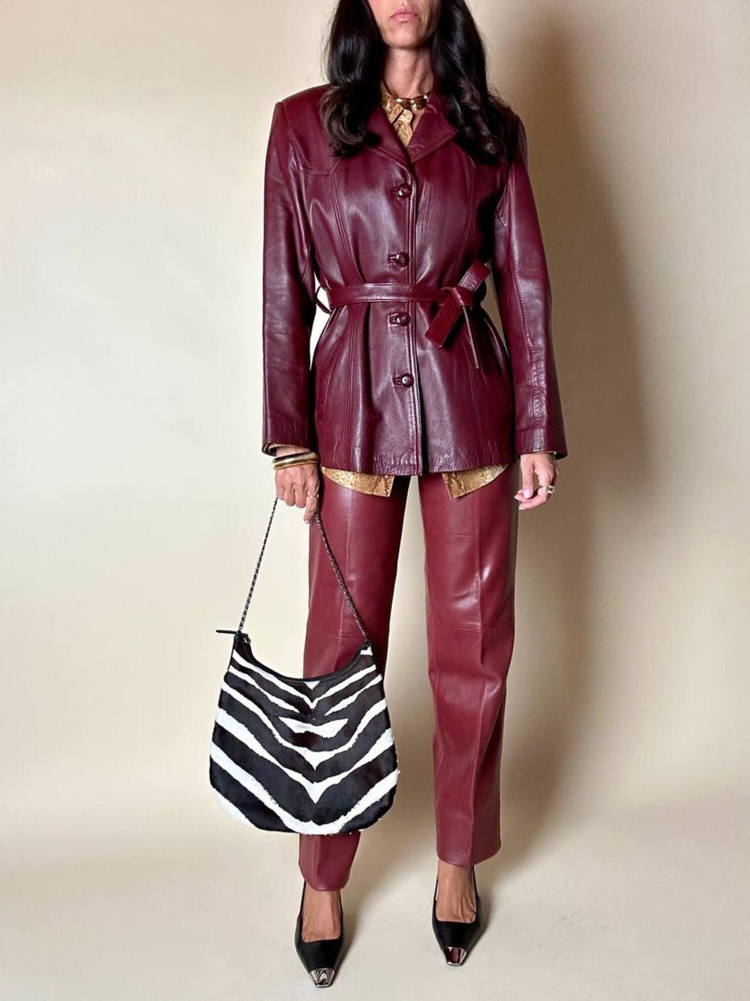Pantalone in pelle mattone rosato a vita alta con pince e cintura in coordinato La Matta