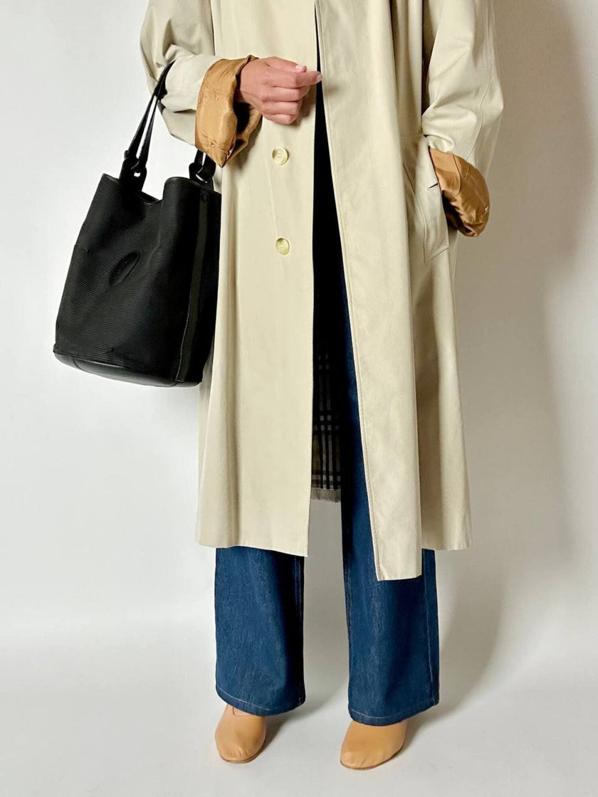 Secchiello vintage Yves Saint Laurent in tessuto nero millerighe con riporti in pelle