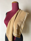 Foulard vintage Yves Saint Laurent in seta biscotto con profili e logo bianchi