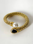 Bracciale vintage in metallo dorato con perla onice nero e cristalli
