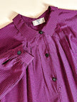 Camicia in seta a quadretti fucsia e neri con con fiocco al collo “Valentino”