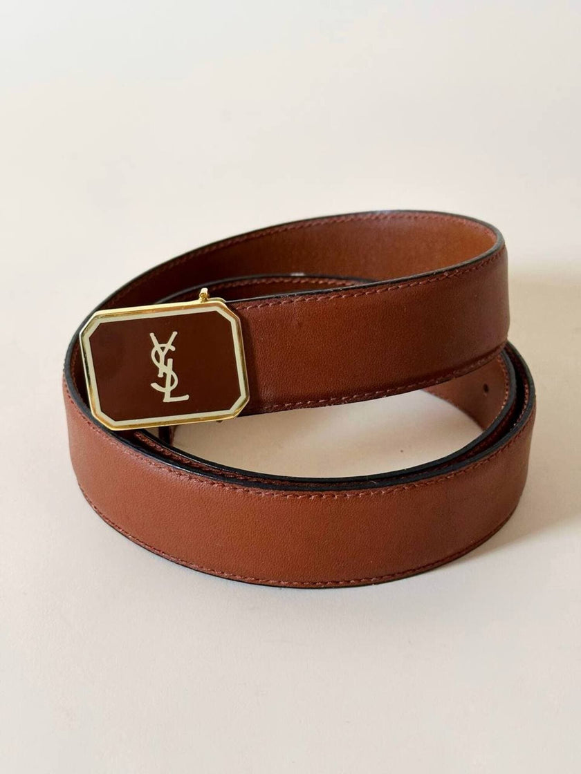 Vintage Yves Saint Laurent tan leather belt with an octagonal enamel buckle and YSL logo
