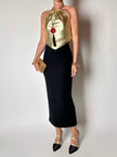 Top vintage con schiena nuda in pelle laminata oro