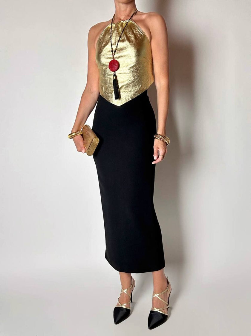 Top vintage con schiena nuda in pelle laminata oro