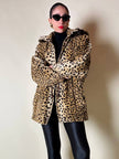 “Yves Saint Laurent” faux fur leopard print parka