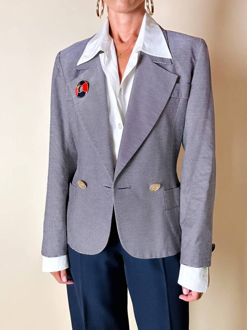 Spilla Yves Saint Laurent a forma di salvagente in metallo oro e smalto rosso e blu