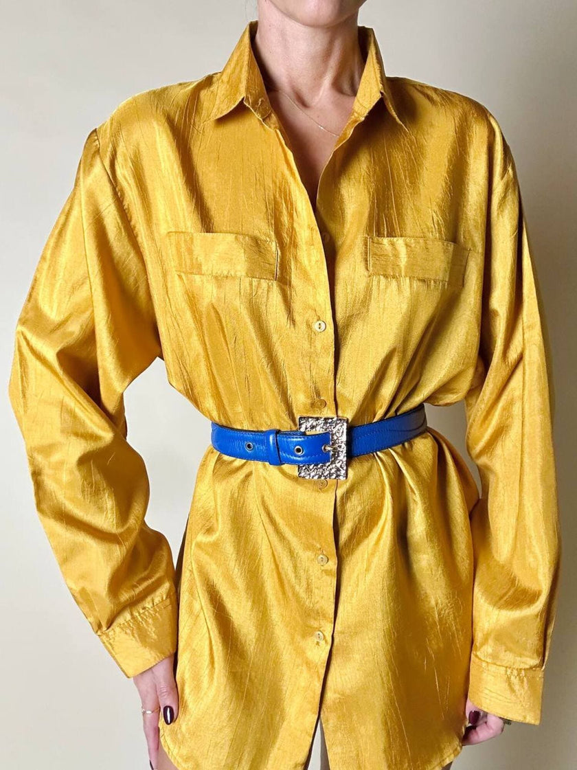 Cintura vintage Yves Saint Laurent in pelle bluette con fibbia gioiello dorata