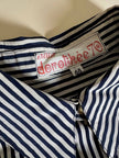Vintage-Bluse aus weiß-schwarzer gestreifter Seide mit goldenen Knöpfen