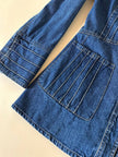 Giacca Christian Lacroix in denim modello sciancrato con lavorazione a nervature