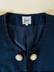 Bolero blu con bottoni gioiello e fiocchi “Max Dinè”