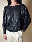 Blusa vintage in pelle nera patchwork con lavorazione crochet e maniche a pipistrello