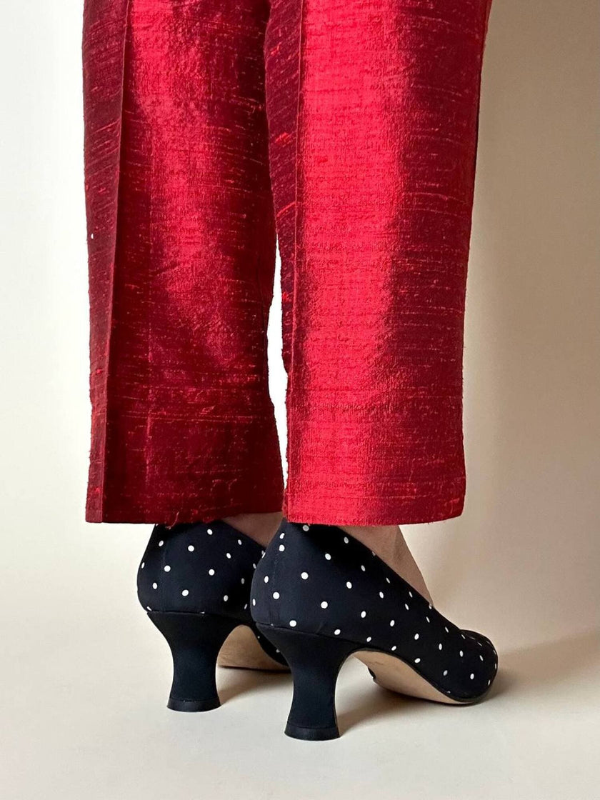 Décolleté in tessuto nero a pois bianchi “Escada”