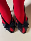 Sandali neri in pelle e raso con fiocco “Yves Saint Laurent”