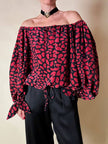 Blusa in seta nera con bocche e cuori rossi “Yves Saint Laurent”