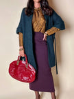 Cardigan Carven in lana verde con manica a tre quarti e cintura in vita