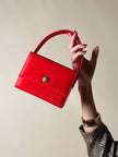 Mini bag in raso rosso “Versace Profumi”