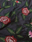 Bolero sartoriale in cotone nero con rose rosse ricamate in perline