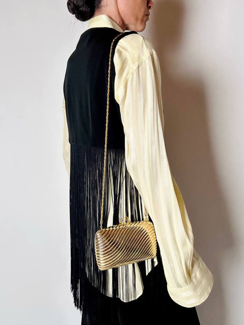 Clutch vintage in metallo dorato con motivo cannelé e chiusura serpenti De Leville