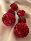 Maxi clip pendenti con sfere ricoperte di perline rosse