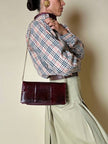 Pochette rettangolare in pitone e pelle bordeaux con tracolla in catena