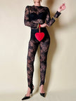 Jumpsuit con staffe in pizzo nero “La Perla”