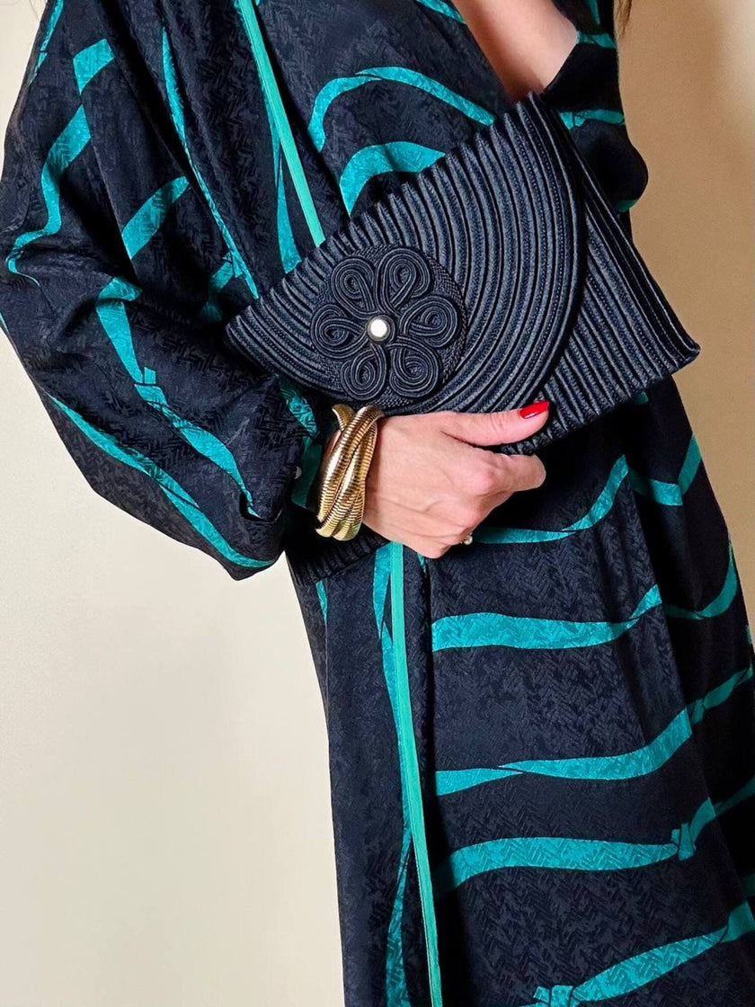 Pochette a busta in passamaneria nera con tracolla “Nina Ricci”