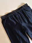 Collant vintage Yves Saint Laurent in lycra lucida nera con elastico logato