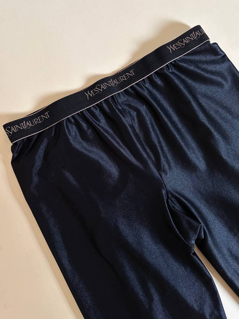 Collant vintage Yves Saint Laurent in lycra lucida nera con elastico logato