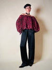 Blusa in seta nera con bocche e cuori rossi “Yves Saint Laurent”