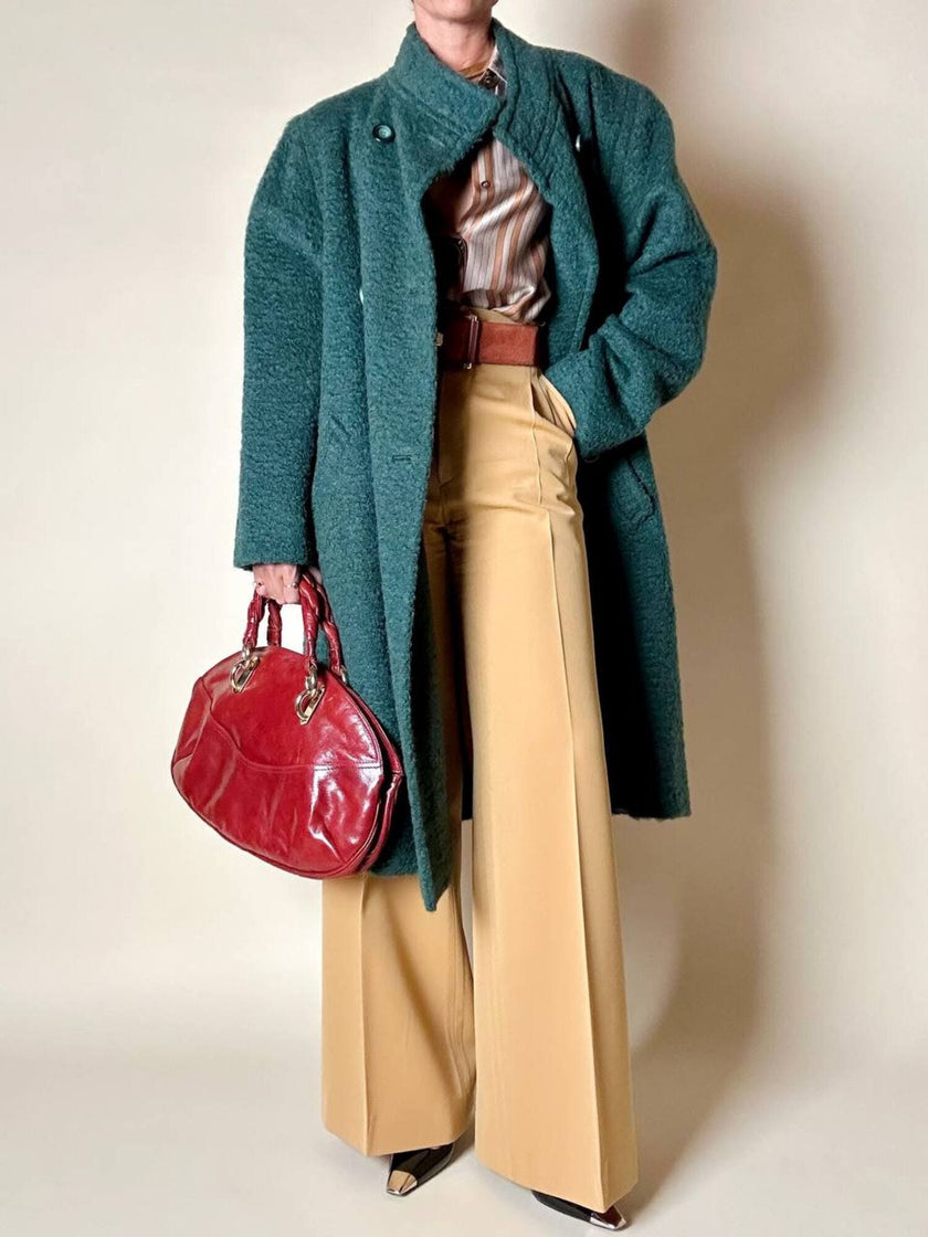 Cappotto doppiopetto in lana bouclé verde bosco con fodera firmata