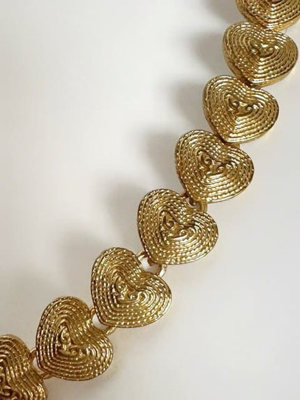 Collier vintage Degerny con cuori dorati lavorati