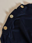 Maglia vintage Yves Saint Laurent in cotone nero con firma ricamata e bottoni dorati