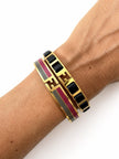 Bracciale vintage Fendi in metallo oro rifinito con smaltato grigio e rosso