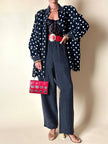 Completo oversize nero a pois bianchi in Cupro “Divina”
