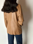 Vintage tan leather jacket with hand-stitched detailing by Claude Collections