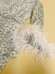 Lace tailleur con piume di marabù