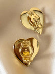 Orecchini a clip Yves Saint Laurent a forma di cuore con cabochon celesti