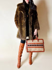 Borsa Yves Saint Laurent in canvas beige con profili color cuoio e motivo greca con logo