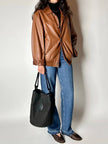Secchiello vintage Yves Saint Laurent in tessuto nero millerighe con riporti in pelle