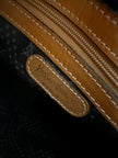 Borsa messenger in pelle nera stampata con profili cuoio “Yves Saint Laurent”