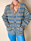 Cardigan Missoni Sport con pattern geometrico e trama tridimensionale nei toni del verde e blu