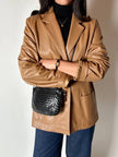 Vintage tan leather jacket with hand-stitched detailing by Claude Collections