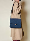 Borsa messenger in tessuto plastificato e pelle blu “Yves Saint Laurent”