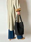 Secchiello vintage Yves Saint Laurent in tessuto nero millerighe con riporti in pelle